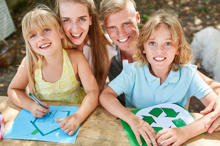 Happy family and kids paint eco recycle logo and home