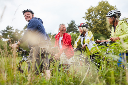 Group of seniors on a bike tour or bike tour as a cycling holidayの写真素材