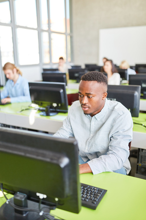 African student in e-learning computer course in university