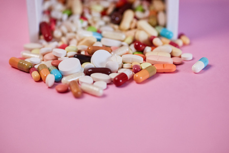 Many colorful medicines and tablets as a medicine conceptの写真素材