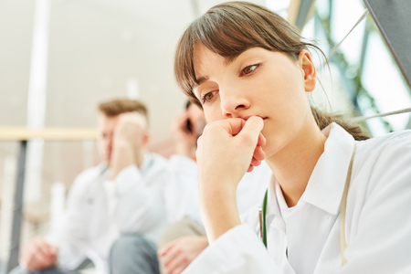 Young woman as medicine student think about problemの写真素材