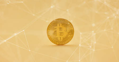 Bitcoin coin with network background as cryptocurrency conceptの写真素材