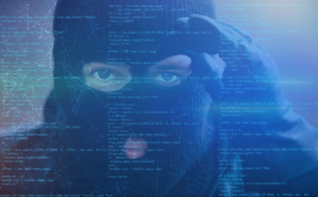 Hacker with spyware in cyberspace as cybercrime concept
