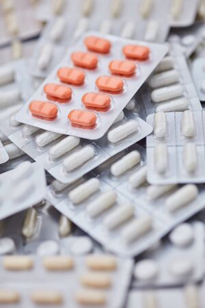 Many drugs in blister packs in a heap
