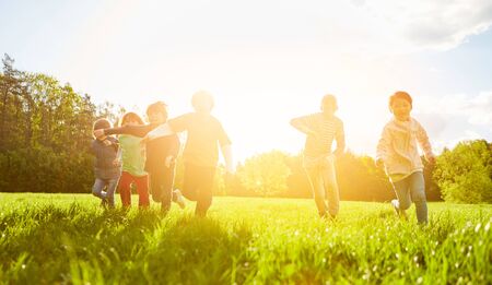 Children make race or race in the park in summerの写真素材