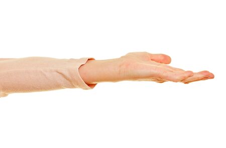 Woman shows open palm while holding handの写真素材