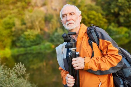Nature photographer with experience in nature on the road with tripod and backpack