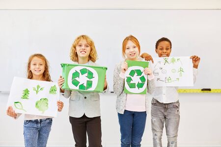 Primary school students as environmentalists are planning a recycling projectの写真素材