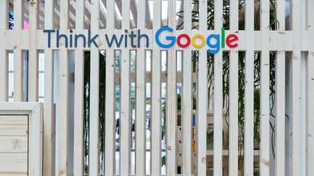 COLOGNE, SEPTEMBER 2019: Google logo with slogan on a wall of the DMEXCO trade fairのeditorial素材
