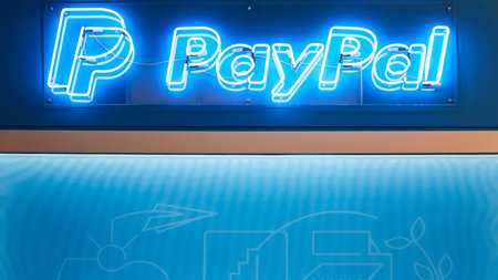 COLOGNE, SEPTEMBER 2019: Blue glowing PayPal logo at the DMEXCO trade trade fairのeditorial素材