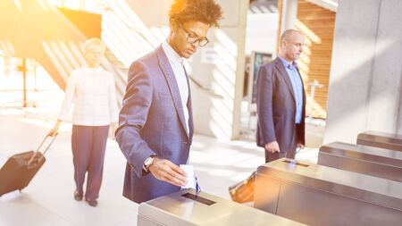 Security in the office through access control at the turnstile for business people
