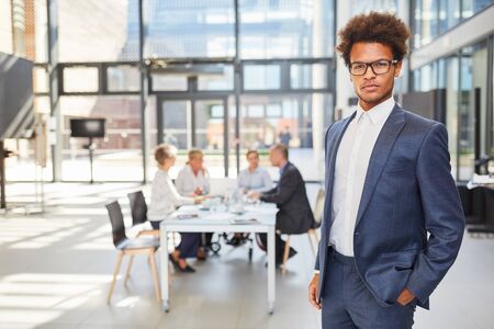 Confident African business start-up founder in his companyの写真素材
