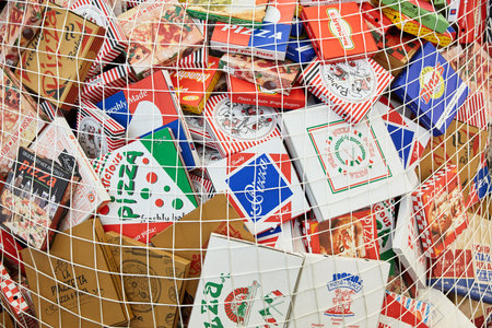 COLOGNE, OCTOBER 2019: Many different pizza boxes at the ANUGA food trade fairのeditorial素材