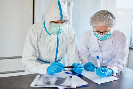 Medical professionals work in protective clothing at the Covid-19 epidemic in a radiology clinic