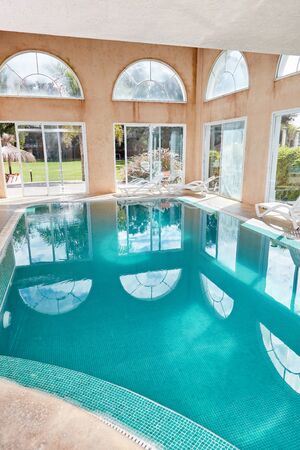 Elegant swimming pool in the spa luxury hotel for the wellness holiday