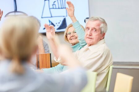 Senior in an adult education course at the adult education center or retirement home