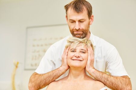Non-medical practitioner as a chiropractor treats a cervical spine syndrome in a senior with...