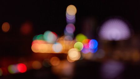 Colorful bokeh lights at the fair as an abstract background