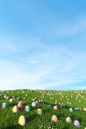 Many colorful Easter eggs lie on a meadow in front of a blue sky for Easter (3d rendering)