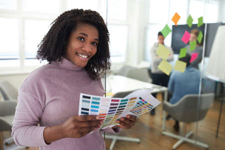African business woman as a graphic designer in the color design of a websiteの写真素材