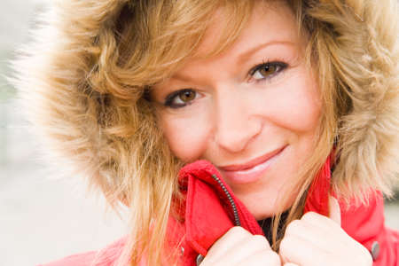 Blond woman with a hood