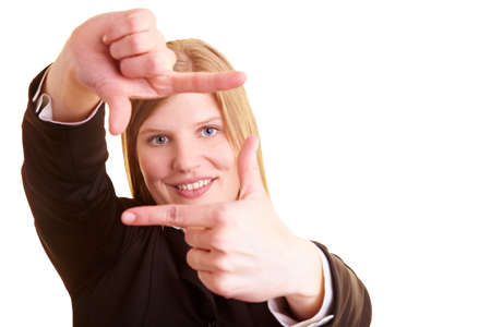 Blonde businesswoman holds finger as a frame