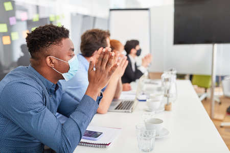 Young business people in a seminar for training or a meetingの写真素材