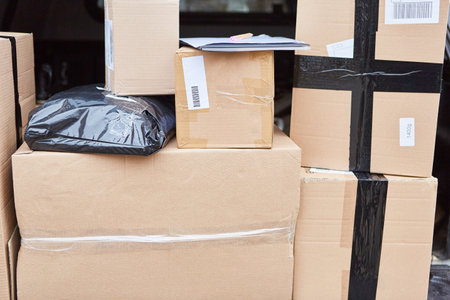 Parcels are ready for delivery in the hold of the delivery service vehicle