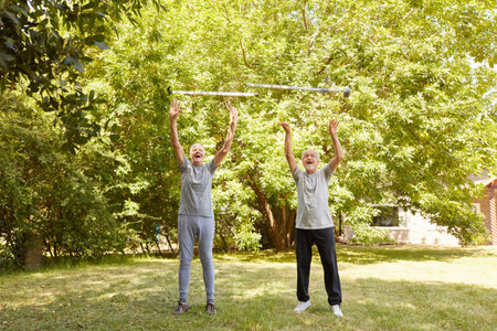 Seniors throwing their canes in the air as a concept for fun and joie de vivre in old age