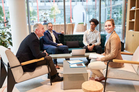 Group of business people discussing a project in a meeting in the office
