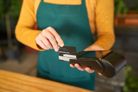 Cashless payment at the card terminal with a credit card or giro card in retail
