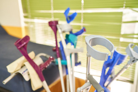 High angle view of various colorful crutches in room of nursing homeの写真素材