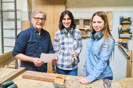 A diverse team in a lumberyard demonstrates teamwork and collaboration. An older mentor guides...