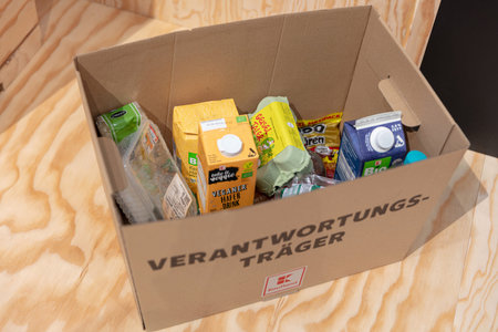 BERLIN, GERMANY, January 16th 2026: Photo of a cardboard box filled with recyclable food packaging is displayed at the Internationale GrÃ¼ne Woche trade fair in Berlin Germany Waste management and recycling efforts.のeditorial素材