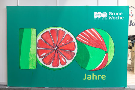BERLIN, GERMANY, January 16th 2026: Photo of A display at the Internationale GrÃ¼ne Woche trade fair in Berlin Germany features citrus fruit graphics and the event logo The promotional signage used at the annual international exhibition for agriculture foのeditorial素材