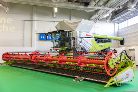 BERLIN, GERMANY, January 16th 2026: Photo of A Claas Lexion combine harvester is on display at the Internationale GrÃ¼ne Woche trade fair in Berlin Germany The agricultural machine is showcased for agriculture and farming equipment.のeditorial素材