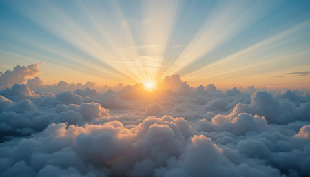 Sunlight streams down through fluffy clouds creating a beautiful ethereal scene representing peace hope and divine inspiration from above a high altitude perspective.の素材