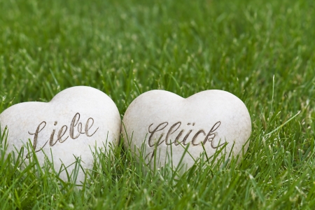 Two hearts in the Grass - love and happinessの写真素材