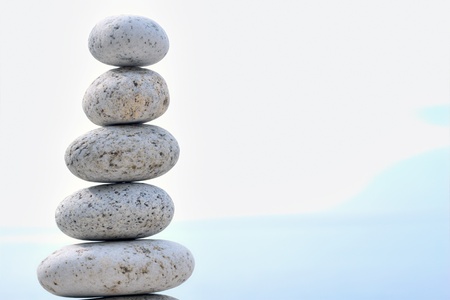 Stacked stones on a background of skyの写真素材