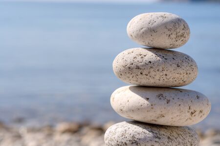 Round stones for meditation laying on seacoast