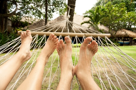 couple in hammockの写真素材