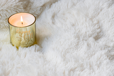 Happy Fall Y'all Gold Candle with White Fur Textureの写真素材
