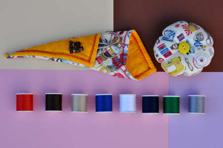 coils, pincushion and scissors holder
