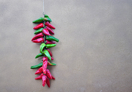 strings of peppers , chilies , garlic and mint