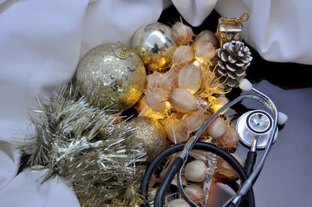 Medical Christmas cards with lights and cone pinesの写真素材