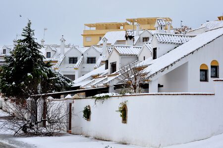 snowy white housesの写真素材