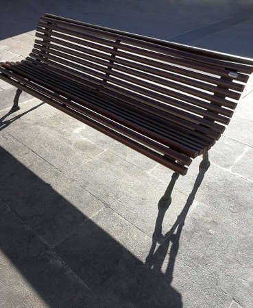 street bench and its shadowの写真素材