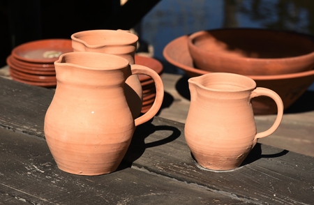 plates and jugs of pottery with red clayの写真素材