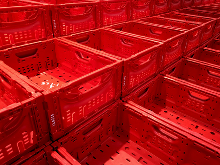 empty red boxes at market