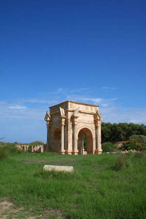 Triumphal Arch to commemorate Septimus Severis at the roman ruins of Leptis Magna in Libyaの写真素材